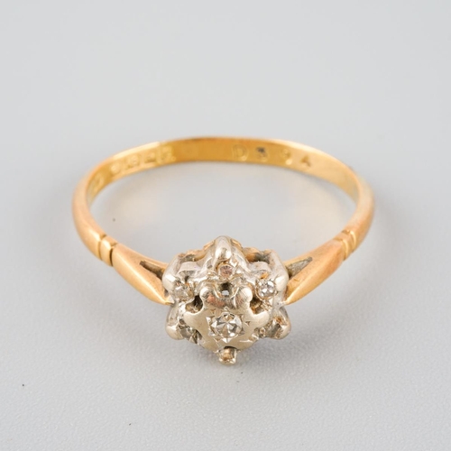 806 - An 18ct gold diamond cluster ring. Hallmarked 18ct gold, approx ring size I (shank bent out of shape... 