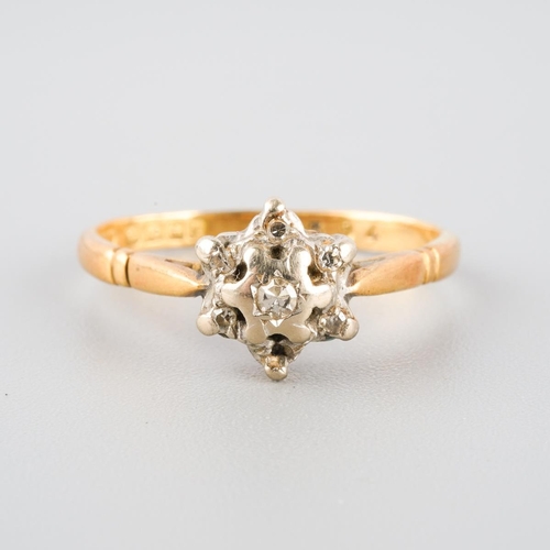 806 - An 18ct gold diamond cluster ring. Hallmarked 18ct gold, approx ring size I (shank bent out of shape... 