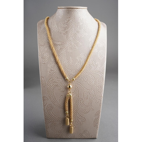 812 - A neckace, stamped 750. The rope twist necklace with textured bar terminals, stamped 750, approx len... 