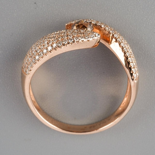 821 - A diamond dress ring. The principal 'Crown Of Light' diamond, measuring approx 3.7mm diameter, to th... 