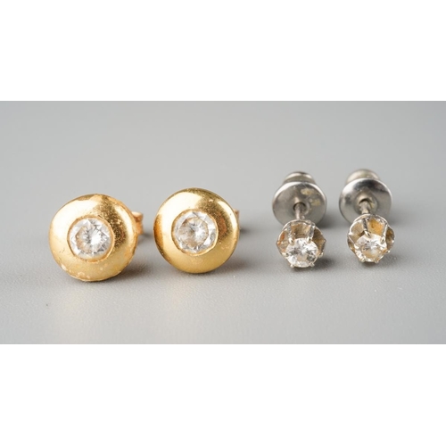 829 - Two pairs of diamond ear studs. Each set with round brilliant cut diamonds, estimated total diamond ... 