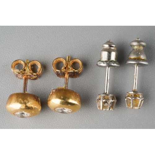 829 - Two pairs of diamond ear studs. Each set with round brilliant cut diamonds, estimated total diamond ... 