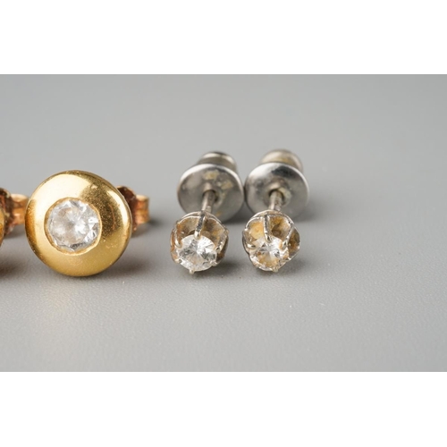 829 - Two pairs of diamond ear studs. Each set with round brilliant cut diamonds, estimated total diamond ... 