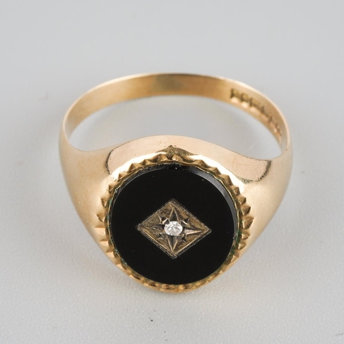 863 - A 9ct gold diamond and onyx signet ring. Hallmarked 9ct gold,  approx ring size P, approx gross weig... 