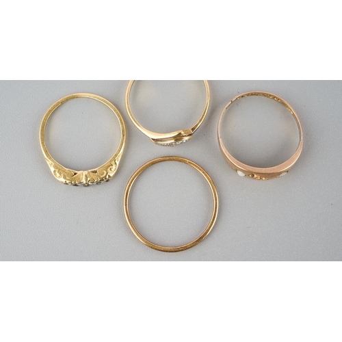 874 - A selection of four gold and diamond set gold rings. To include a 22ct gold wedding band (hallmakred... 