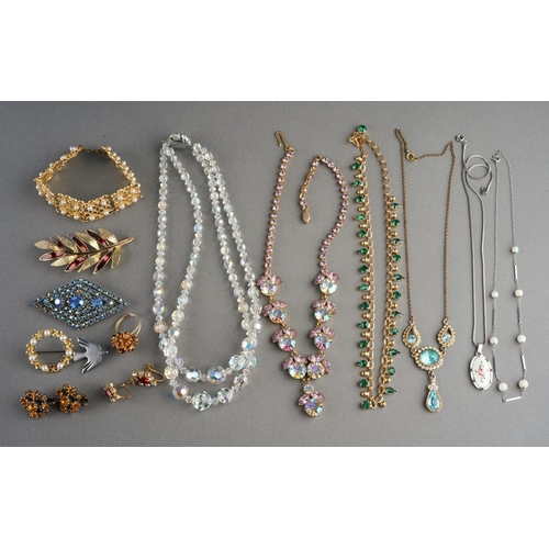 884 - A collection of costume jewellery to include earrings, necklaces, brooches and one ring