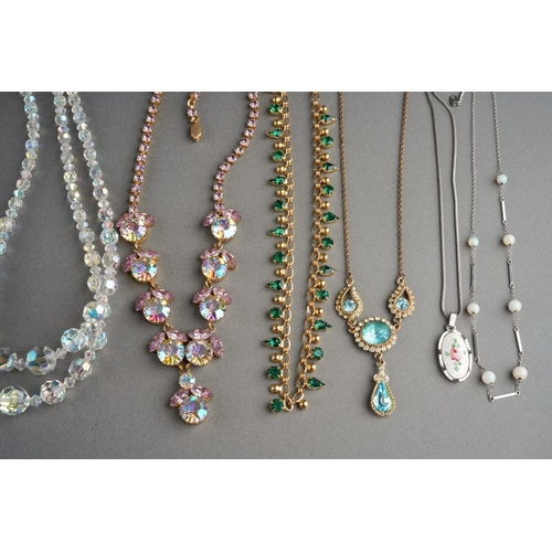 884 - A collection of costume jewellery to include earrings, necklaces, brooches and one ring