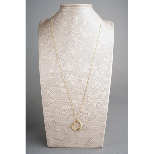 916 - A diamond pendant and chain. The heart shape pendant set with graduated round brilliant and single c... 