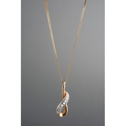 917 - A 9ct gold diamond pendant and chain. Approx length pendant 19mm, approx length chain 450mm, pendant... 