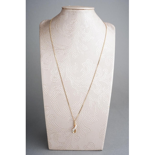 917 - A 9ct gold diamond pendant and chain. Approx length pendant 19mm, approx length chain 450mm, pendant... 
