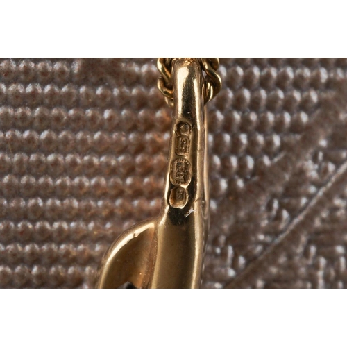 917 - A 9ct gold diamond pendant and chain. Approx length pendant 19mm, approx length chain 450mm, pendant... 