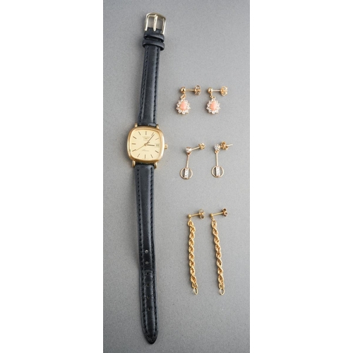 918 - A Longines quartz watch, together with three pairs of earrings, all unmarked, two pairs assessed as ... 