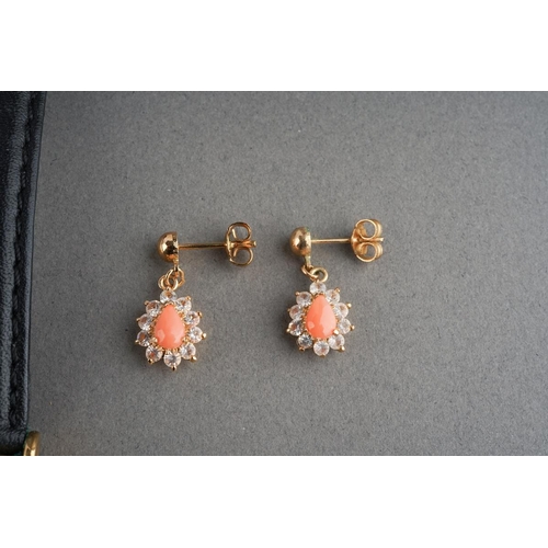 918 - A Longines quartz watch, together with three pairs of earrings, all unmarked, two pairs assessed as ... 