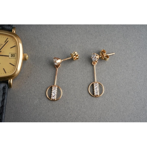 918 - A Longines quartz watch, together with three pairs of earrings, all unmarked, two pairs assessed as ... 