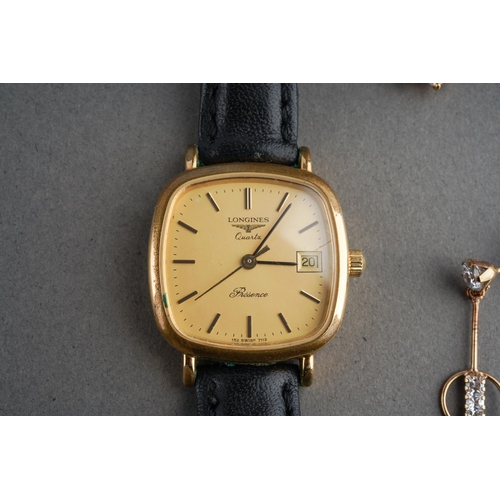 918 - A Longines quartz watch, together with three pairs of earrings, all unmarked, two pairs assessed as ... 