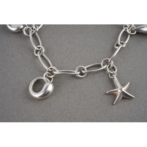 927 - A charm bracelet by Elsa Peretti for Tiffany & Co. The bracelet suspending five charms, bracelet sig... 