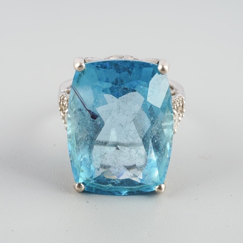 956 - A topaz ring. Stamped 925, approx ring size M, approx gross weight 9.45 gram.