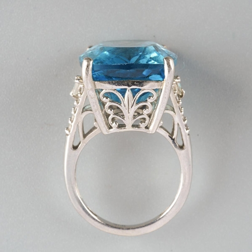 956 - A topaz ring. Stamped 925, approx ring size M, approx gross weight 9.45 gram.