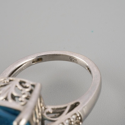 956 - A topaz ring. Stamped 925, approx ring size M, approx gross weight 9.45 gram.