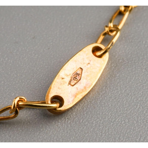 976 - A 9ct gold tiepin and a gold plated tiepin. The 9ct gold tie pin with 9ct gold import marks for Lond... 