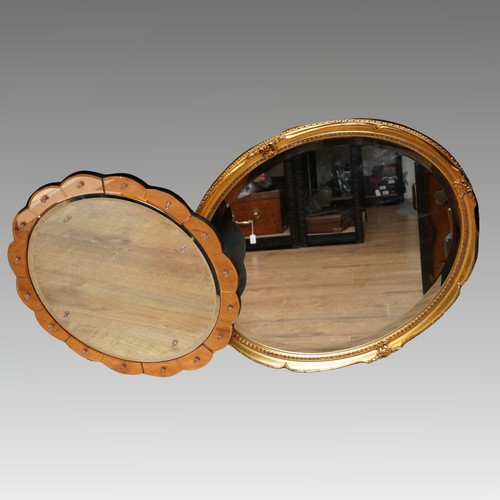 107 - Two Mirrors to include a Venian style mid 20th century round one (2)