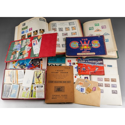 143 - A collection of World stamp, cigarette cards and trade cards, in albums and loose, including The Tri... 