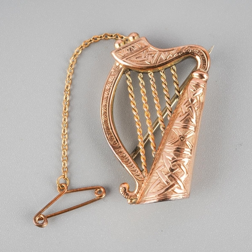 991A - An early 20th century 9ct gold harp brooch. Hallmarked 9ct gold Dublin 1905, approx length brooch 36... 