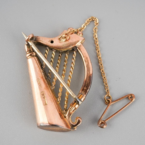 991A - An early 20th century 9ct gold harp brooch. Hallmarked 9ct gold Dublin 1905, approx length brooch 36... 