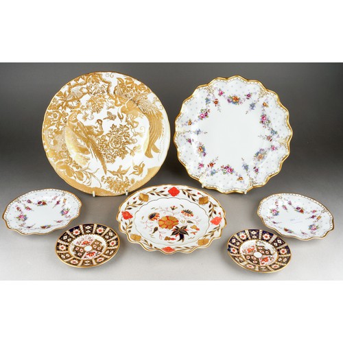 273 - Five assorted Royal Crown Derby plates and two Royal Crown Derby 2451 pattern saucers, the plate pat... 
