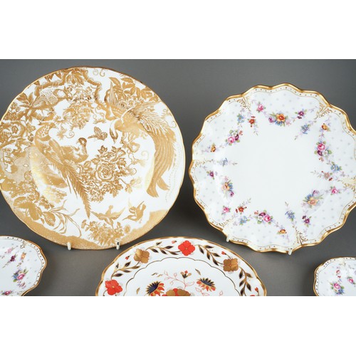 273 - Five assorted Royal Crown Derby plates and two Royal Crown Derby 2451 pattern saucers, the plate pat... 