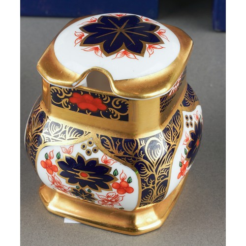 276 - A boxed Royal Crown Derby 1128 Imari solid gold band pattern bell of square form, first quality, pri... 