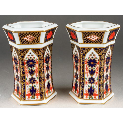 281 - A pair of Royal Crown Derby 1128 Imari pattern hexagonal vases, both first quality, printed factory ... 