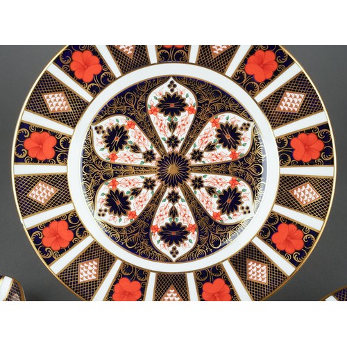 286 - Three pieces of Royal Crown Derby 1128 Imari, comprising a crescent shaped salad plate, a soup plate... 
