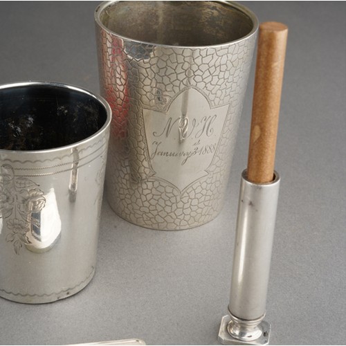 647 - A collection of silver to include two Christening cups, a Christening spoon and fork set, a seal sta... 