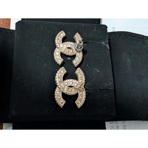 882 - A collection of designer items to include Vivienne Westwood and Chanel. Each with designer case. Nec... 