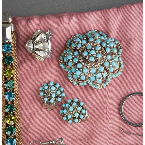 851 - A bag of costume jewellery including three silver threepences, a silver band, a brooch and earrings ... 