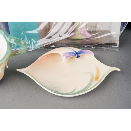 6 - Two boxed Franz Porcelain cups and saucer including Blossom-Iris including spoon, FZ02080E and Drago... 
