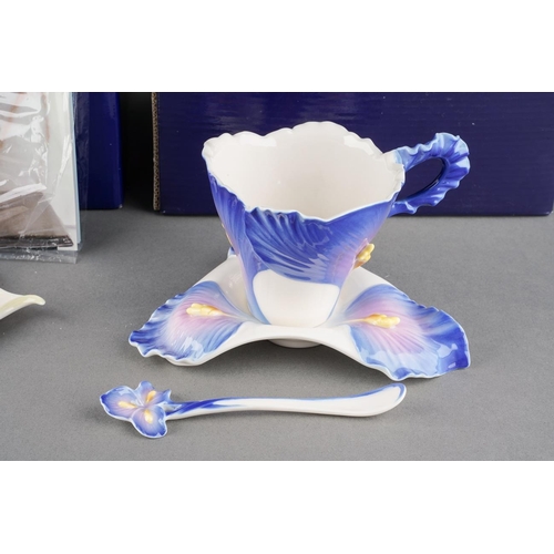 6 - Two boxed Franz Porcelain cups and saucer including Blossom-Iris including spoon, FZ02080E and Drago... 