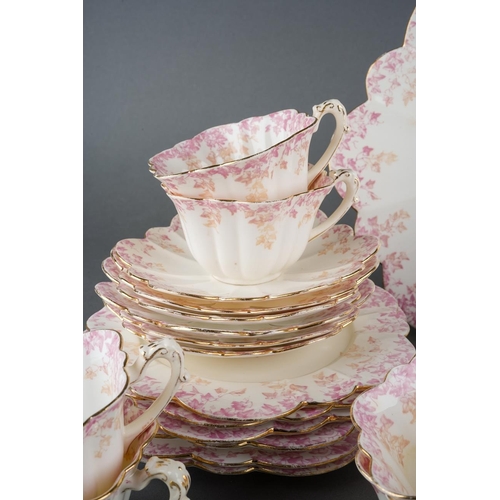 12 - A twenty one piece Wileman & Co Foley China tea set in the 5042 Empire shape, pink and beige printed... 