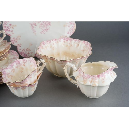 12 - A twenty one piece Wileman & Co Foley China tea set in the 5042 Empire shape, pink and beige printed... 