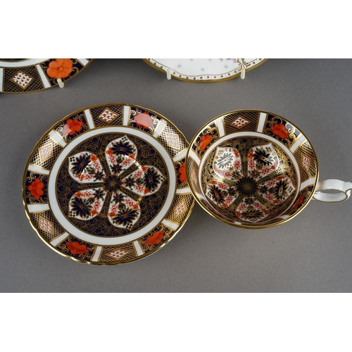 21 - A Royal Crown Derby Imari 1128 pattern tea cup and saucer and an 1128 pattern tea plate, diameter 18... 