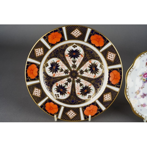 21 - A Royal Crown Derby Imari 1128 pattern tea cup and saucer and an 1128 pattern tea plate, diameter 18... 