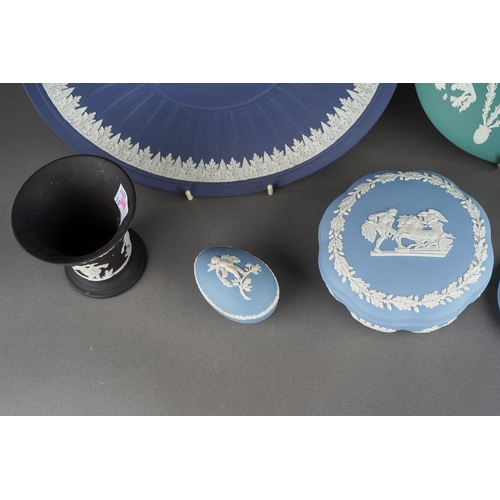 22 - Seven pieces of 20th century Wedgwood jasperware, comprising a teal plate with Classical decoration,... 