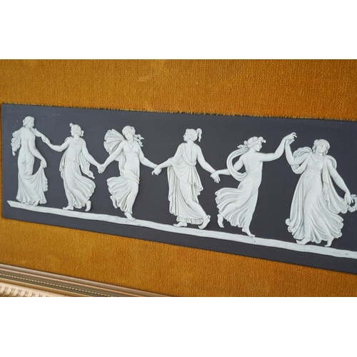 27 - A framed Wedgwood black basalt Dancing Hours rectangular plaque, within a velvet mount and gilt fram... 
