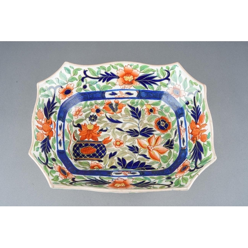 46 - An early 19th Century stoneware rectangular bowl, shaped rim on scroll feet, approx 26cm long [1]