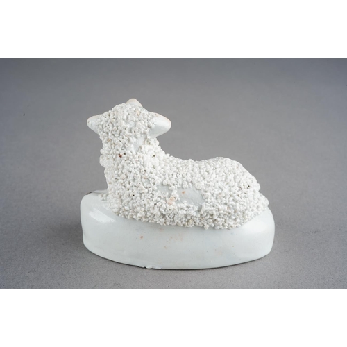 49 - An early 19th Century Staffordshire recumbent sheep, approx 8cm long [1]