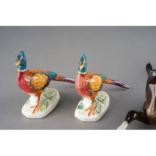 59 - A Beswick Brown foal, model no 915, impressed marks together with a Beswick Dapple [Rocking Horse] G... 