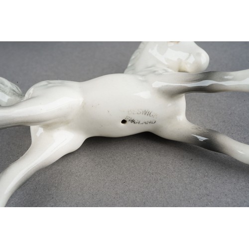 59 - A Beswick Brown foal, model no 915, impressed marks together with a Beswick Dapple [Rocking Horse] G... 