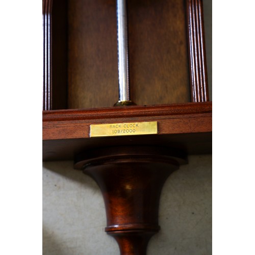 A reproduction limited edition mahogany cased gravity / rack clock ...