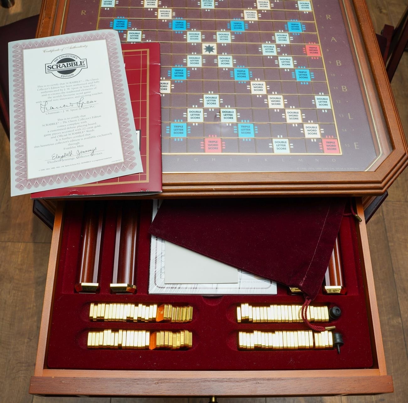 A Franklin Mint Collector's Edition Scrabble board on swivel mahogany ...